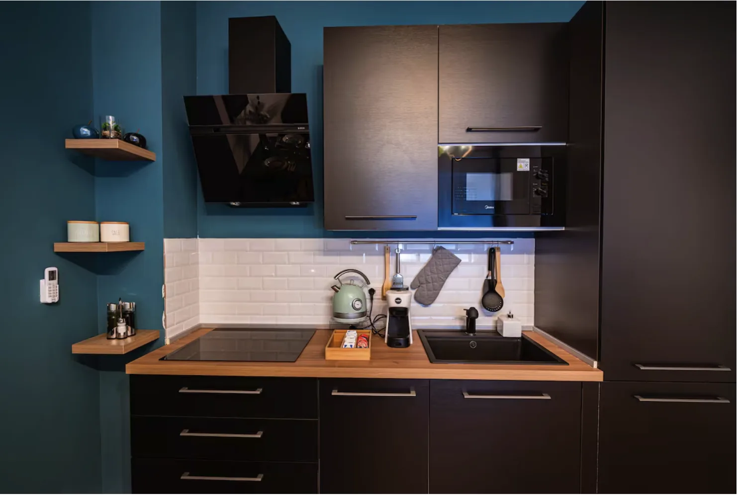 Cucina completamente attrezzata nella casa vacanze Glam Turin Apartment